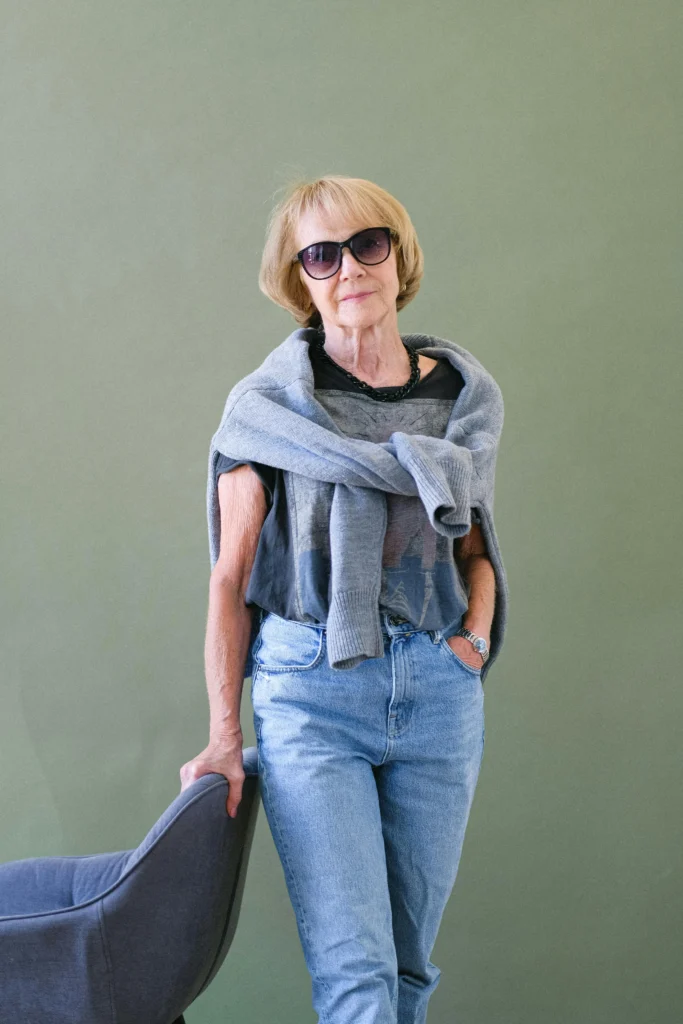 "An Old Woman wearing oversized Vervet Jeans brand showcasing a relaxed and trendy fit perfect for casual, effortless style."
