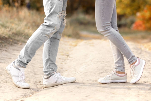 Variety of boyfriend jeans styles displayed, including high-waisted, distressed, and cuffed designs. Each pair showcases a relaxed fit ideal for casual and trendy outfits