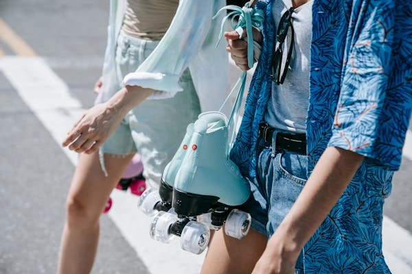 Close-up of low-rise jean shorts, highlighting care tips for washing, drying, and storing to maintain their style and durability."